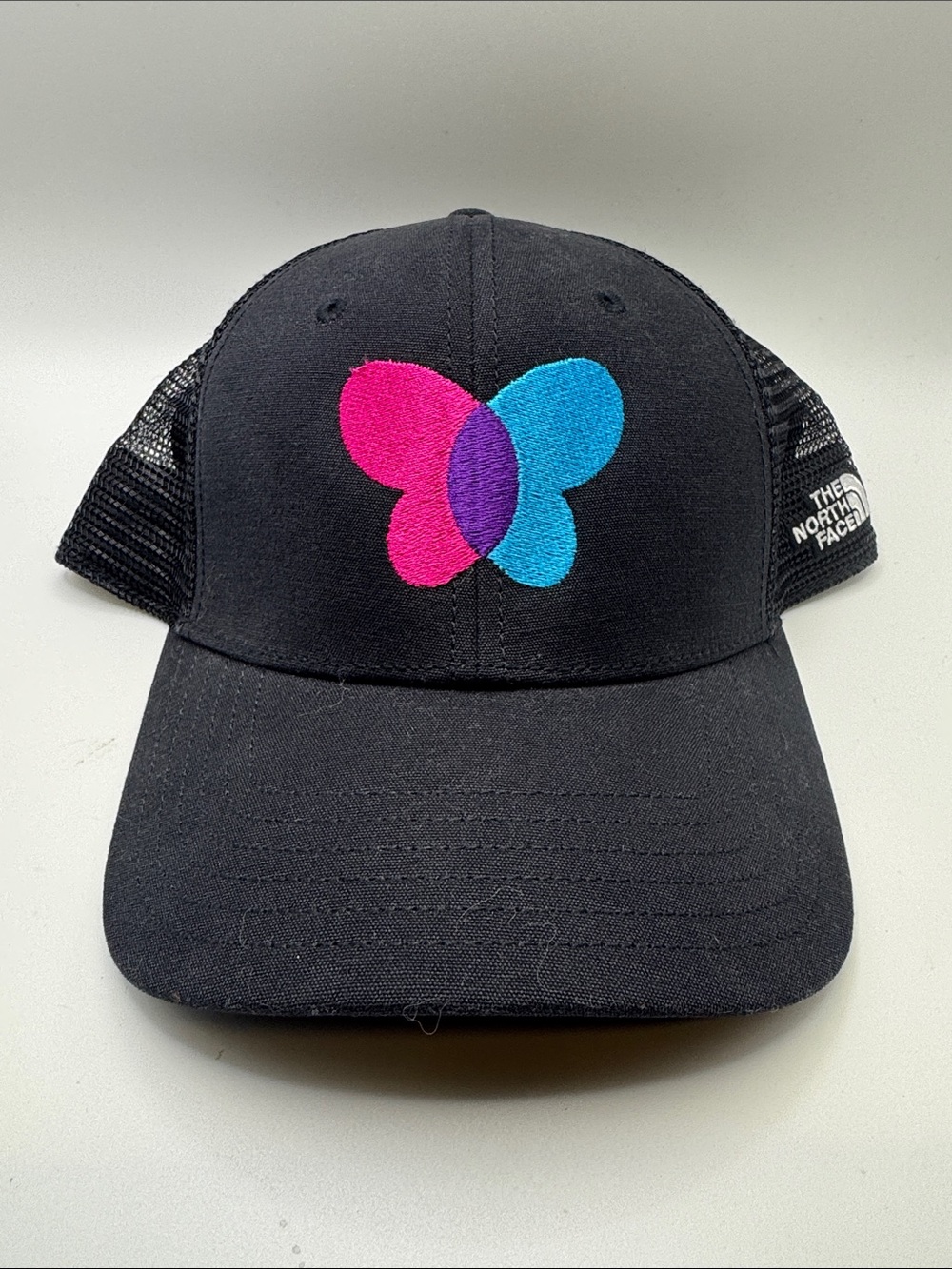 The North Face Black Trucker Hat with Pink, Blue & Purple Butterfly